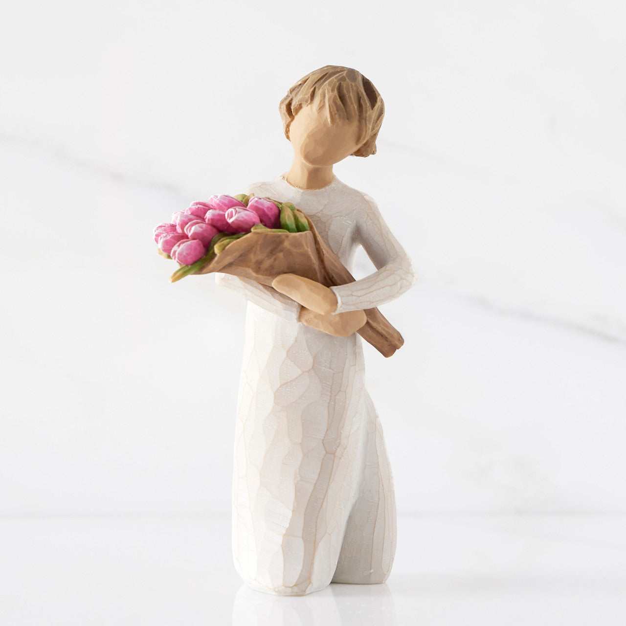 Bright Hope figurine with tulips as a confidence and encouragement gift